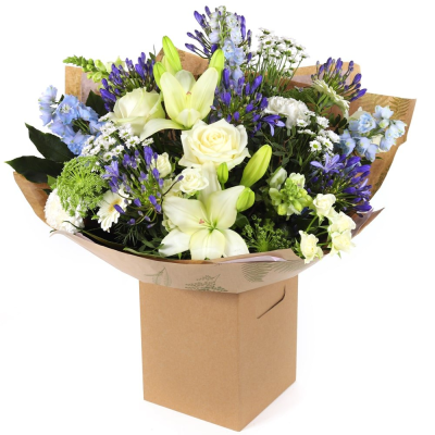 Oceanic Bliss - Revel in the elegance of this luxurious bouquet, featuring a captivating mix of white and blue blooms. Presented in beautiful packaging, it’s perfect for making a sophisticated statement.